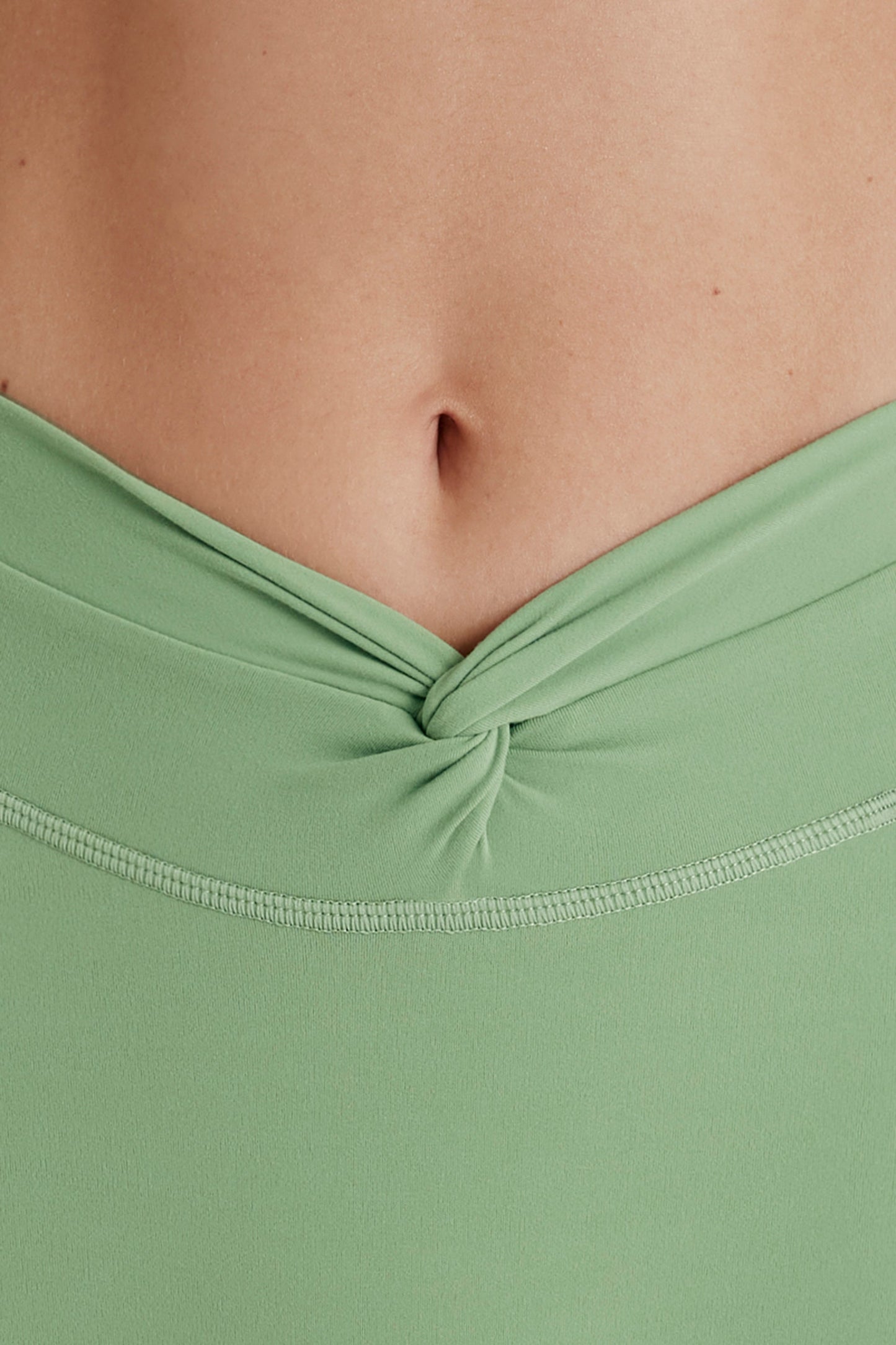 Soft Active Twist-Front Mini Shorts in Green