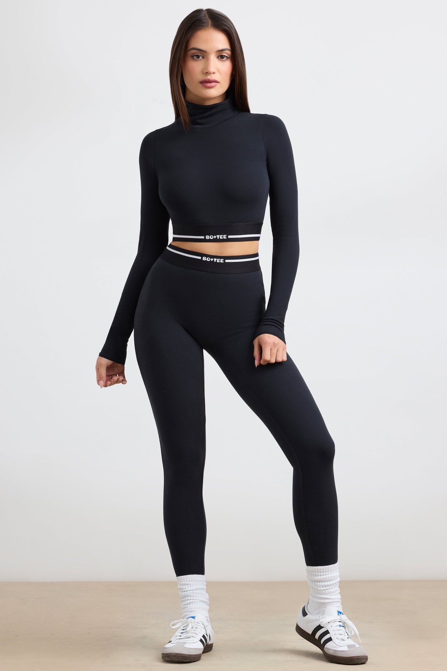 Stretch Cotton Jersey Backless Turtleneck Long-Sleeve Crop Top in Black