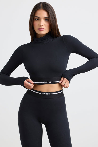Stretch Cotton Jersey Backless Turtleneck Long-Sleeve Crop Top in Black