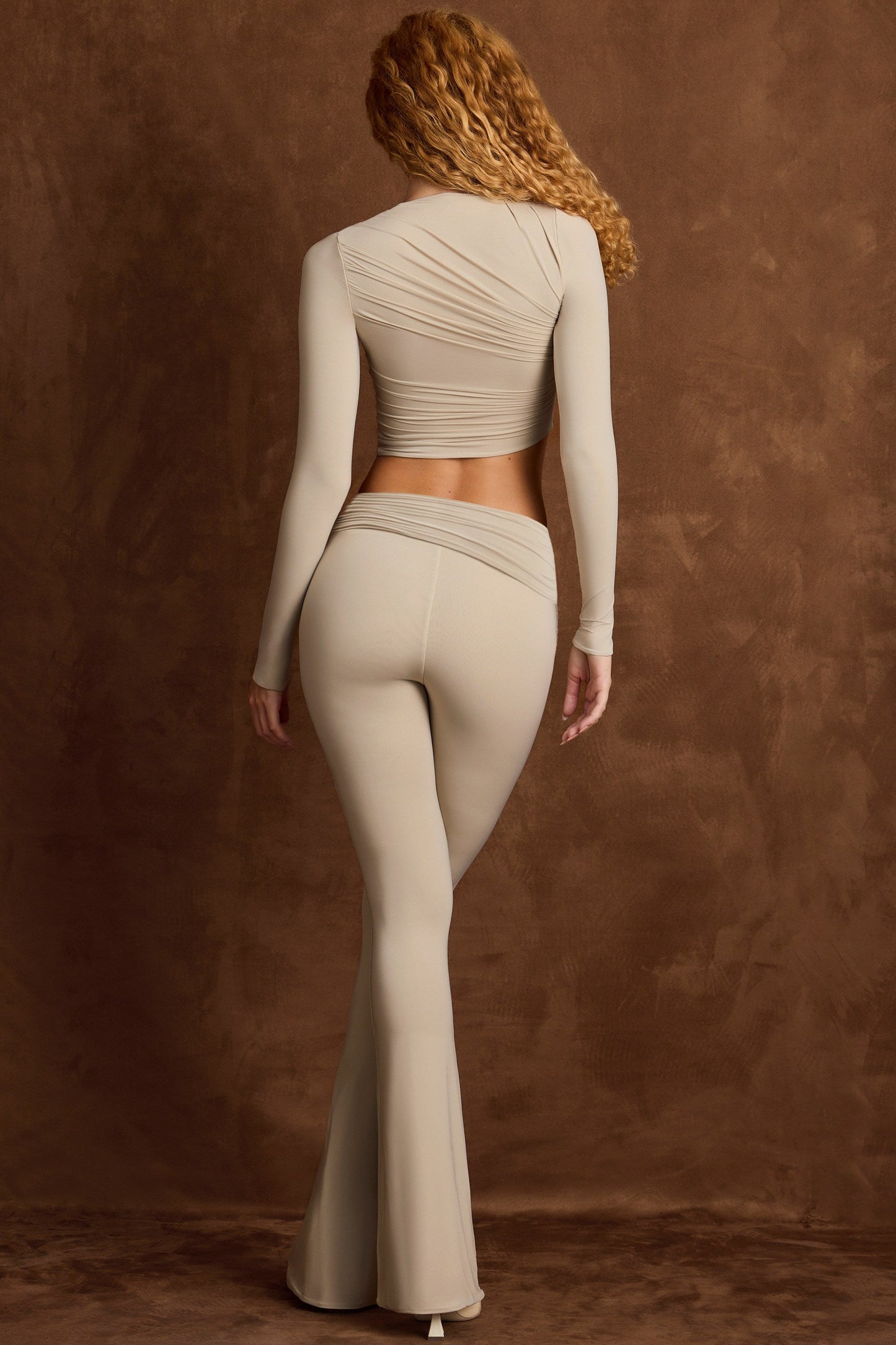 Asymmetric Draped Mid-Rise Flared Trousers in Taupe