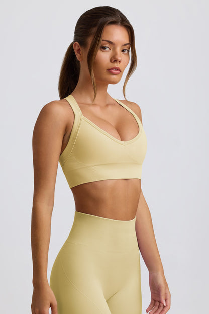 Super Sculpt Seamless Cross-Back Sports Bra in Butter Yellow